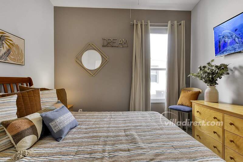 Bedroom 2: queen bed and TV