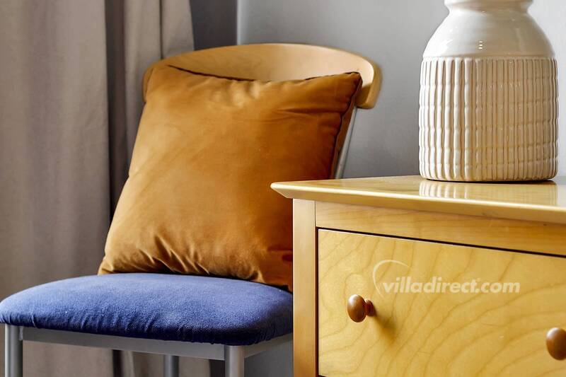 Bedroom 2: chair, dresser