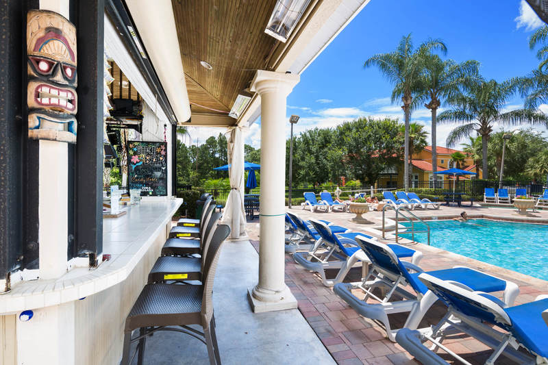 Sit and enjoy a cool, tall drink at the pool side tiki bar that's the perfect place to spend an afternoon while the kids splash and play in the clubhouse waters.