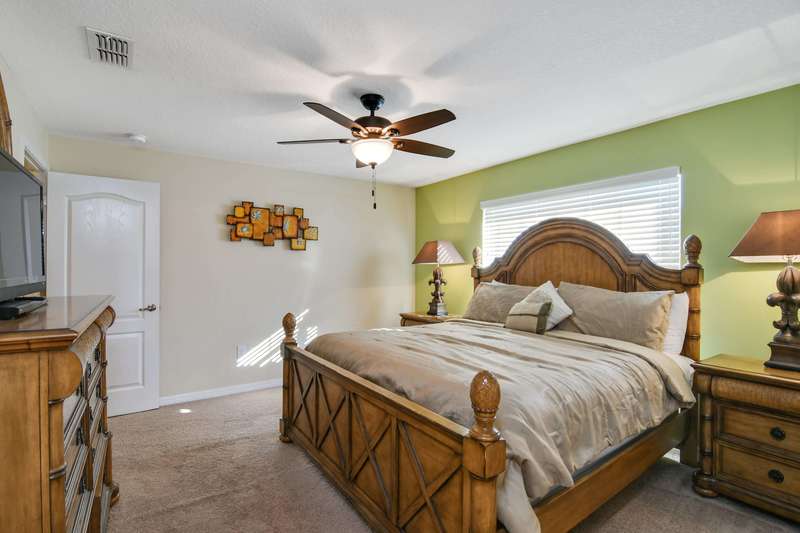 This spacious and comfortable master suite is the perfect place for mom and dad to ''recharge their batteries'' after an action-packed day at the parks with the kids!