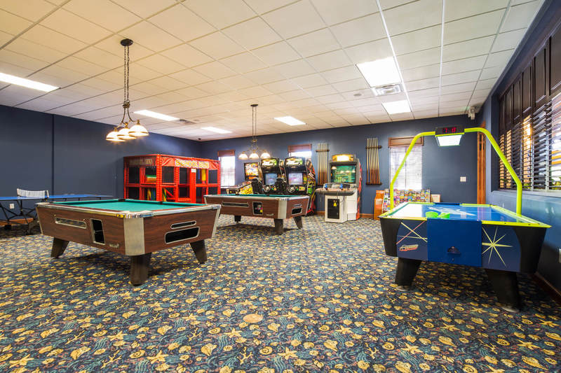 You can enjoy all the games in this recreation room at the <strong>Paradise Palms</strong> clubhouse, or let the kids enjoy a couple of hours of fun while you enjoy a drink at the tiki bar by the pool.