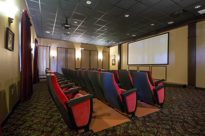 Sit and watch one of the family-friendly movies that are shown in this theater each day at the <strong>Paradise Palms</strong> clubhouse.